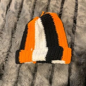 #320 handmade Orange, Black, and White Beanie